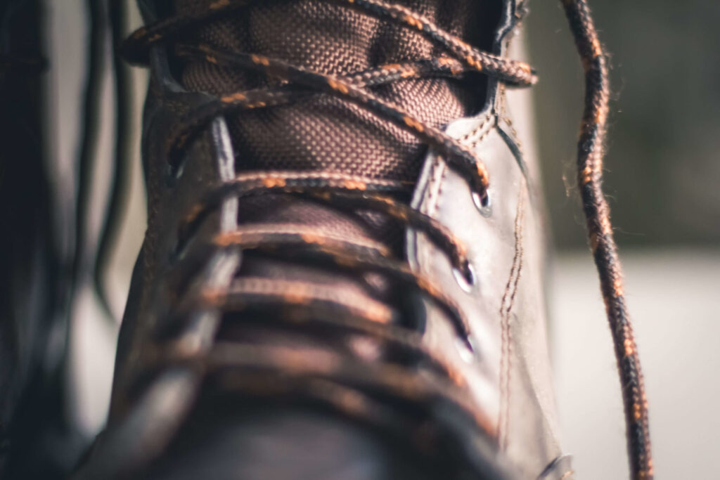 Closeup of brown concrete work boot