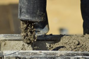 What is a volumetric concrete mixer?