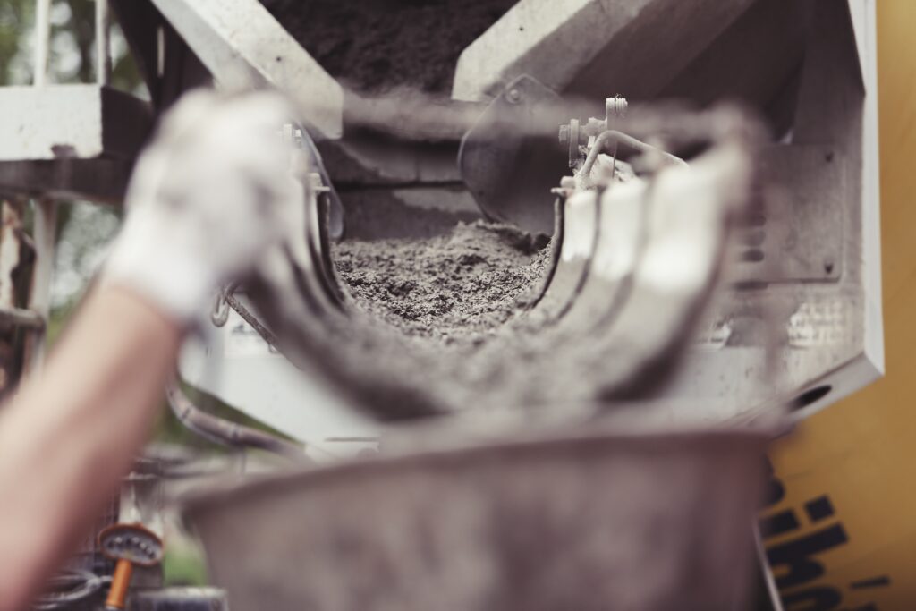 Concrete pouring from a chute of a ready mix concrete truck